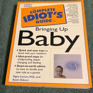“Complete Idiot’s Guide to Bringing up Baby” oversized paperback book